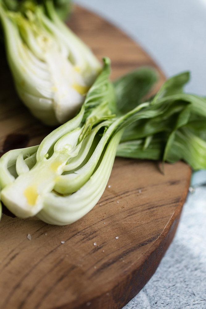 bok choy sliced on wooden board